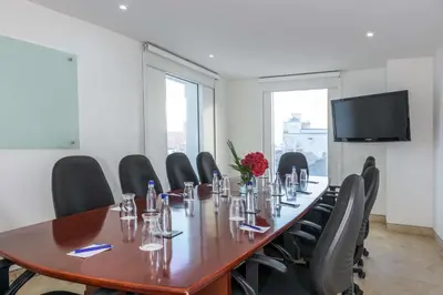 a conference room with a long table and chairs at NH Royal Urban Cartagena in Cartagena de Indias