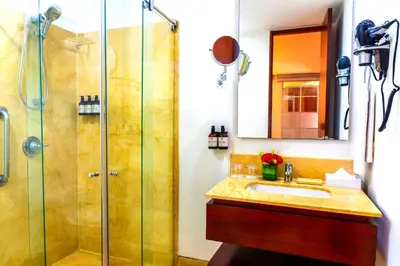 a bathroom with a sink and a shower at NH Royal Urban Cartagena in Cartagena de Indias