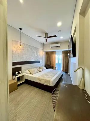 a hotel room with a bed and a table at Cartagena Royal Hotel Boutique in Cartagena de Indias