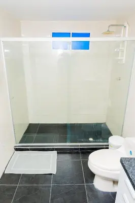 a bathroom with a shower and a toilet at Departamento Bocagrande cerca a playas in Cartagena de Indias