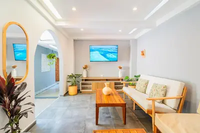 a living room with a couch and a table at Casa Del Pozo Boutique - Full House in Cartagena de Indias