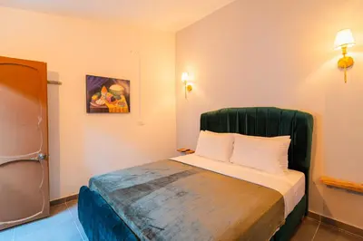 a hotel room with a bed in a room at Casa Del Pozo Boutique - Full House in Cartagena de Indias