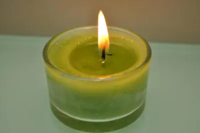 a small candle is sitting on a table at Hotel Or Cartagena in Cartagena de Indias