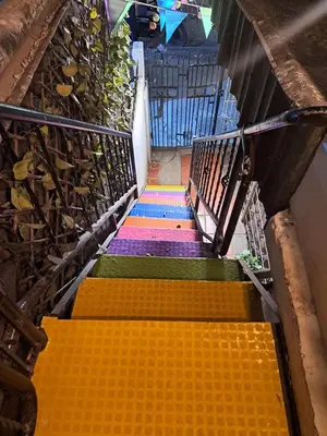 an overhead view of a staircase with colorful steps at Hostel Shalom Adonai in Cartagena de Indias