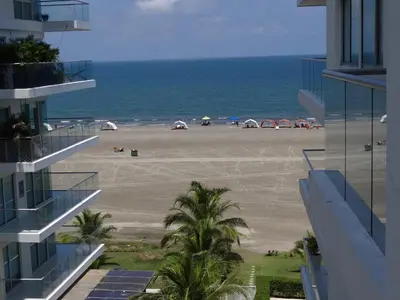 a view of the beach from the balcony of a building at Morros Vitri Cartagena in Cartagena de Indias