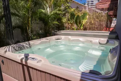 a jacuzzi tub sitting on top of a balcony at Mucura Hotel & Spa in Cartagena de Indias