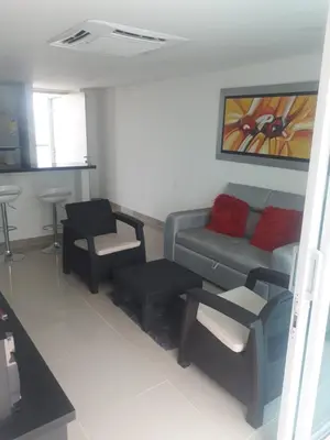 a living room with a couch and a chair at Apartamento seaway 935 Morros, La Boquilla in Cartagena de Indias