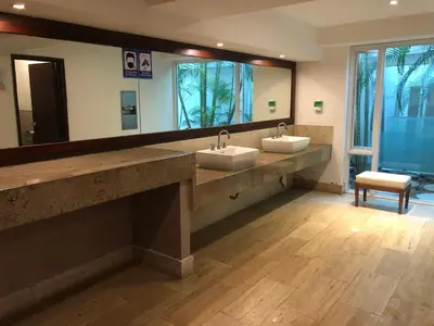 a bathroom with two sinks and a large mirror at morros 3 in Cartagena de Indias