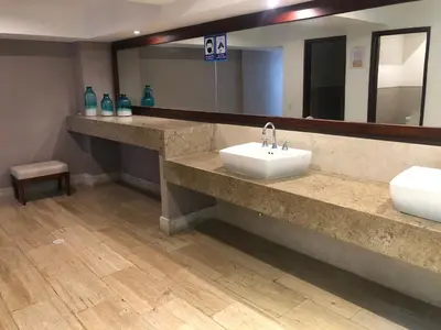 a bathroom with two sinks and a large mirror at morros 3 in Cartagena de Indias