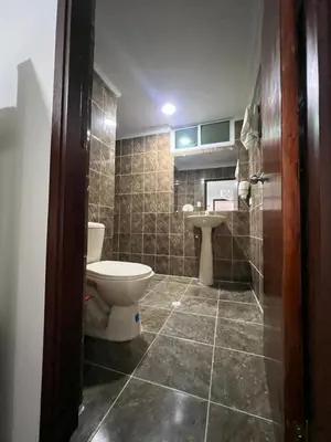 a bathroom with a toilet and a sink at Alojamientos Cartagena Edificio Los Delfines in Cartagena de Indias