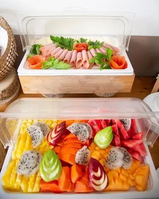 a refrigerator filled with lots of different types of sushi at Delirio Hotel in Cartagena de Indias