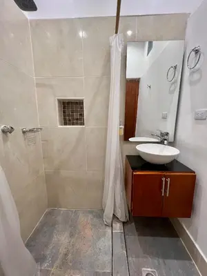 a bathroom with a sink and a shower at Luxury Suite Room in Cartagena de Indias