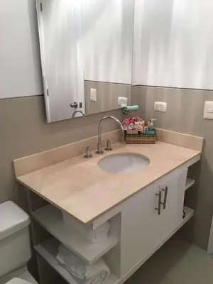 a bathroom counter with a sink and a mirror at Apartamento Confort Frente a la Playa en Cartagena! in Cartagena de Indias