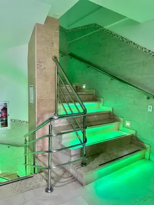 a set of stairs with green lights on them at Hotel La Esperanza in Cartagena de Indias