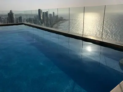 a swimming pool on the top of a building at Excelente Apartamento en Murano Elite en Bocagrande, Cartagena in Cartagena de Indias