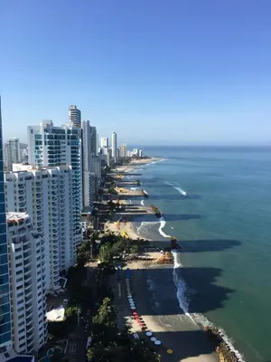 an aerial view of a beach with buildings and the ocean at Excelente Apartamento en Murano Elite en Bocagrande, Cartagena in Cartagena de Indias