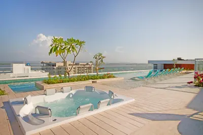 a pool with a hot tub on top of a building at Cielo Mar Regatta - LivinColombia in Cartagena de Indias