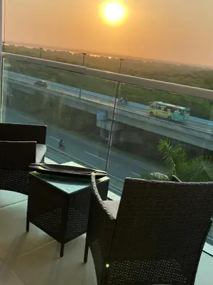 a balcony with a view of a highway with a train at APTO EN LA BOQUILLA CARTAGENA MORROS 922 in Cartagena de Indias