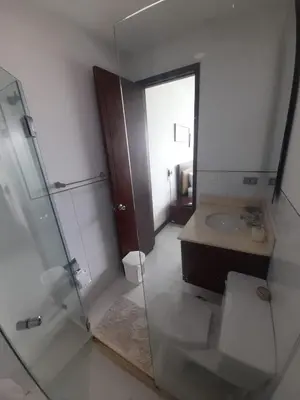 a bathroom with a glass shower and a sink at APTO EN LA BOQUILLA CARTAGENA MORROS 922 in Cartagena de Indias