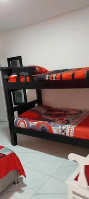 a couple of bunk beds in a room at LA MEDELLIN HOSTAL in Cartagena de Indias