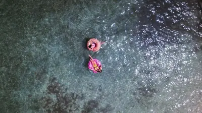 an overhead view of two objects in the water at Hotel Cocoliso Island Resort in Isla Grande