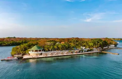 an island in the water with a gazebo at Hotel Cocoliso Island Resort in Isla Grande
