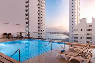 a swimming pool on the roof of a building at Hampton by Hilton Cartagena in Cartagena de Indias