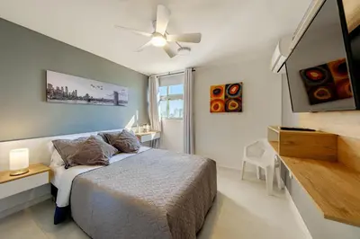 a bedroom with a bed and a ceiling fan at Alojamiento con Vista Y Salida al Mar in Cartagena de Indias
