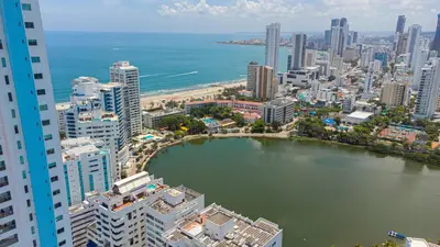 an aerial view of a city with a body of water at Cozy Apartment in El Laguito in Cartagena de Indias