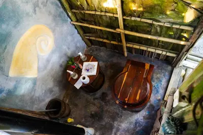 an overhead view of a wooden toilet in a room at Canto de Caracola in Rincón