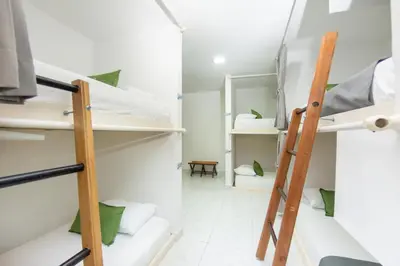 a room with bunk beds and a ladder at Hotel Ayenda Cartagena Blue 1804 in Cartagena de Indias