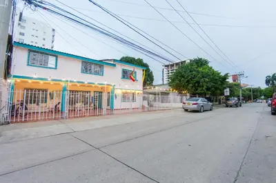 a street with a building on the side of the road at Hotel Ayenda Cartagena Blue 1804 in Cartagena de Indias