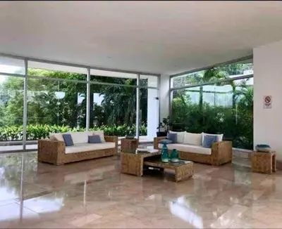 a large living room with two couches and a table at Cartagena Morros 3 Playa in Cartagena de Indias