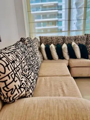 a couch with pillows on it in a living room at MORROS EPIC luxury in Cartagena de Indias