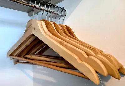 a bunch of wooden utensils hanging from a rack at Modern 1BR WiFi Breathtaking Oceanviews by Huespedia in Cartagena de Indias