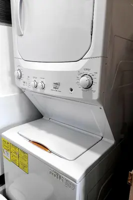 a microwave oven sitting on top of a refrigerator at Modern 1BR WiFi Breathtaking Oceanviews by Huespedia in Cartagena de Indias