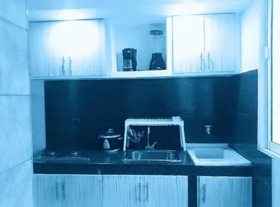 a kitchen with a sink and a counter top at Comodo Apartamento en Bocagrande Cartagena 801B in Cartagena de Indias