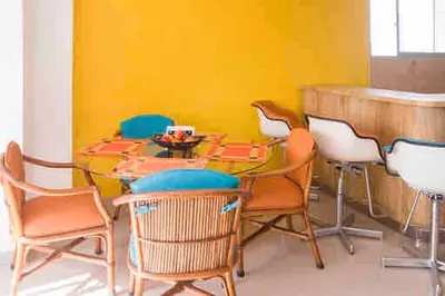 a dining room with a table and chairs at IV 2 bedroom apartment in Cartagena de Indias