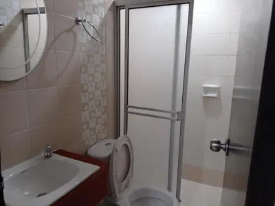 a bathroom with a shower and a toilet and a sink at APTO INTERIOR in Cartagena de Indias