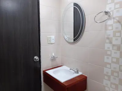 a bathroom with a sink and a mirror at APTO INTERIOR in Cartagena de Indias