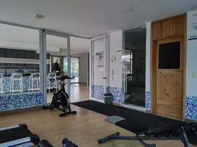 a room with a gym with a treadmill and a exercise bike at Playa Bello Horizonte, vista preciosa in Gaira
