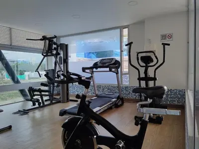 a gym with several exercise bikes in a room at Playa Bello Horizonte, vista preciosa in Gaira