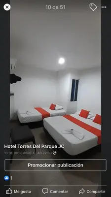 a picture of two beds in a room at Hotel Torres del Parque No1 in Soledad