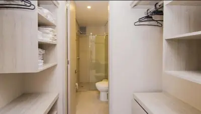a bathroom with a toilet and a walk in shower at Martinique1621 in Cartagena de Indias