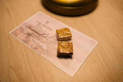 two pieces of food on a napkin on a table at Casa Franco Hotel in Cartagena de Indias