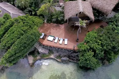 an aerial view of an island with a resort at Isla Única- Islas del Rosario in Isla Grande