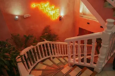 a stairway with a sign that says the only way is up at CASA MOVIDA HOSTEL in Cartagena de Indias
