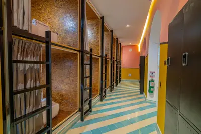 a hallway with blue and white flooring in a building at CASA MOVIDA HOSTEL in Cartagena de Indias