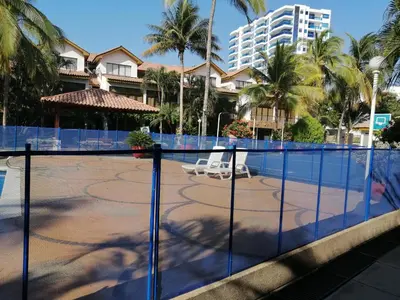 a volleyball court in front of a resort at Casa, playa Bello Horizonte Santa Marta Colombia in Santa Marta