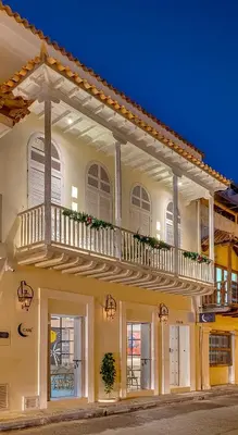 a large white building with a balcony on it at Lunalá Hotel Boutique in Cartagena de Indias